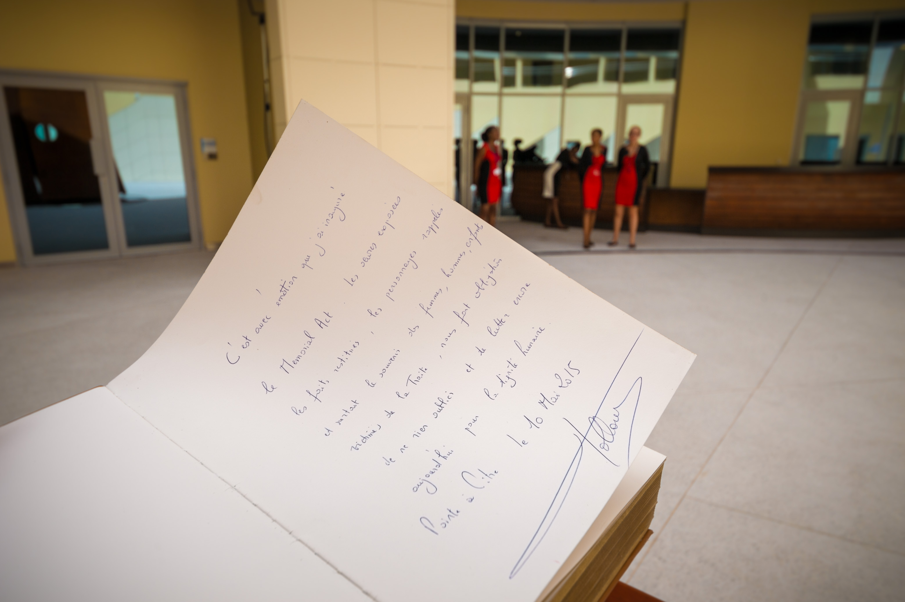 France, Guadeloupe, Pointe-à-Pitre, signature du livre d'or par François HOLLANDE, Président de la République Française, lors de l'inauguration du Mémorial ACTe, des architectes et maîtres d'oeuvre Fabien Doré, Pascal Berthelot et Jean-Michel Mocka-Célestine, plus grand mémorial de l'esclavage au monde, construit sur le site Darboussier qui était jusqu'en 1980 une usine sucrière et le plus gros employeur en Guadeloupe//France, Guadeloupe, Pointe-à-Pitre, signing the guest book by François HOLLANDE, President of the French Republic, during the inauguration of the Memorial ACTe, architects and project managers Fabien Doré, Pascal Berthelot and Jean-Michel Mocka-Celestine, largest memorial of slavery in the world, built on the site Darboussier which was until 1980 a sugar factory and the largest employer in Guadeloupe