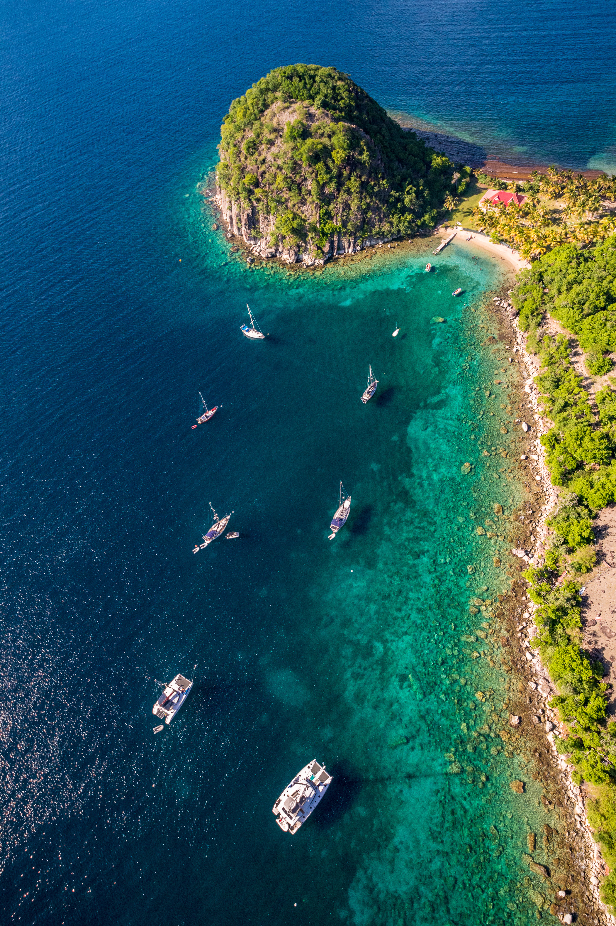 France, Caraïbes, Petites Antilles, Guadeloupe, Les Saintes, Terre-de-Haut, vue aérienne sur la baie du bourg de Terre-de-Haut, classée par l'UNESCO parmi les 10 plus belles baies au monde, ici le Pain de Sucre // France, Caribbean, Lesser Antilles, Guadeloupe, Les Saintes, Terre-de-Haut, aerial view on the bay of the town of Terre-de-Haut, classified by UNESCO among the 10 most beautiful bays in the world, here the Pain de Sucre