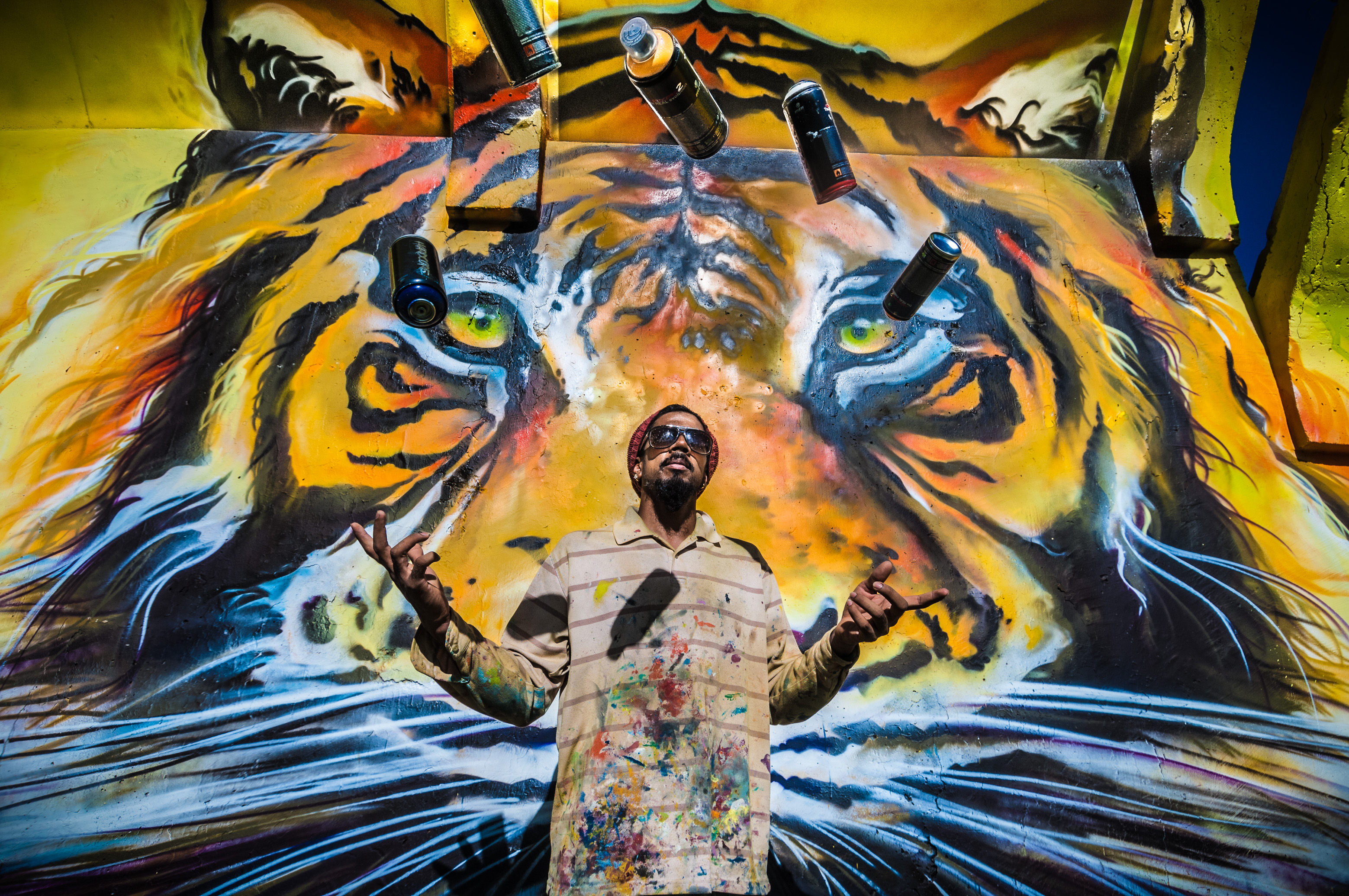 France, Guadeloupe, Basse-Terre, Baie-Mahault, street artiste Jimmy SHEIKBOUDHOU devant une partie de sa fresque sur les murs du stade municipal // France, Guadeloupe, Basse-Terre, Baie-Mahault, street artist Jimmy SHEIKBOUDHOU front part of his fresco on the walls of the municipal stadium